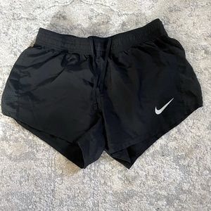 Black Nike running shorts